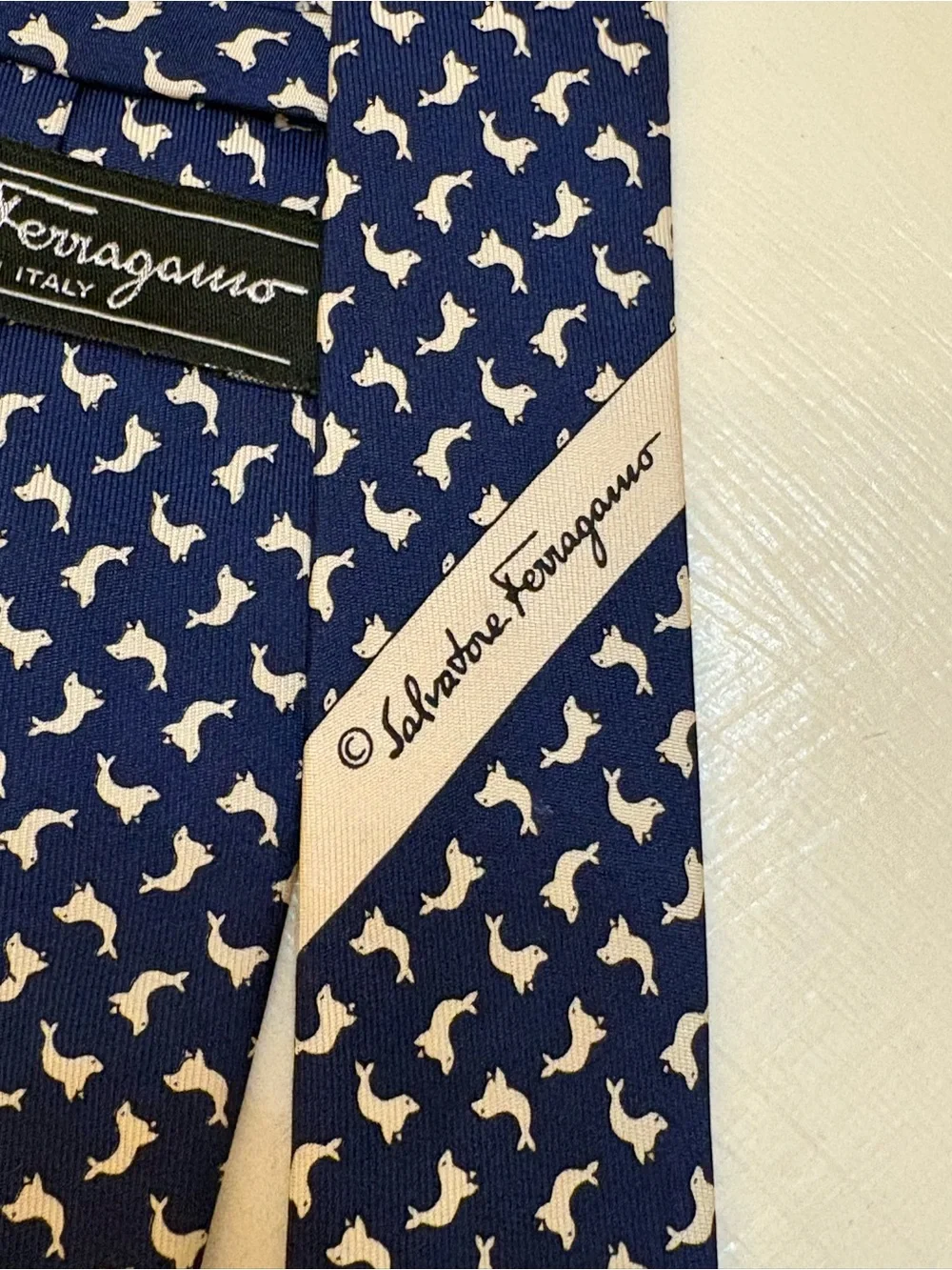 Salvatore Ferragamo Navy Tie with white Seals, new. 100% silk